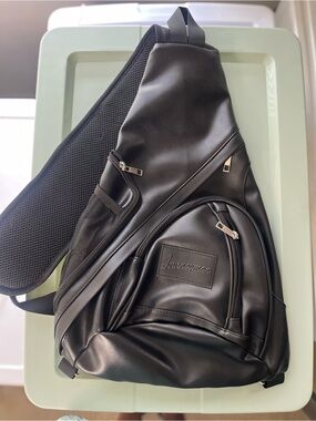 Black Leatherette Sling Bag with Multiple Zip Pockets